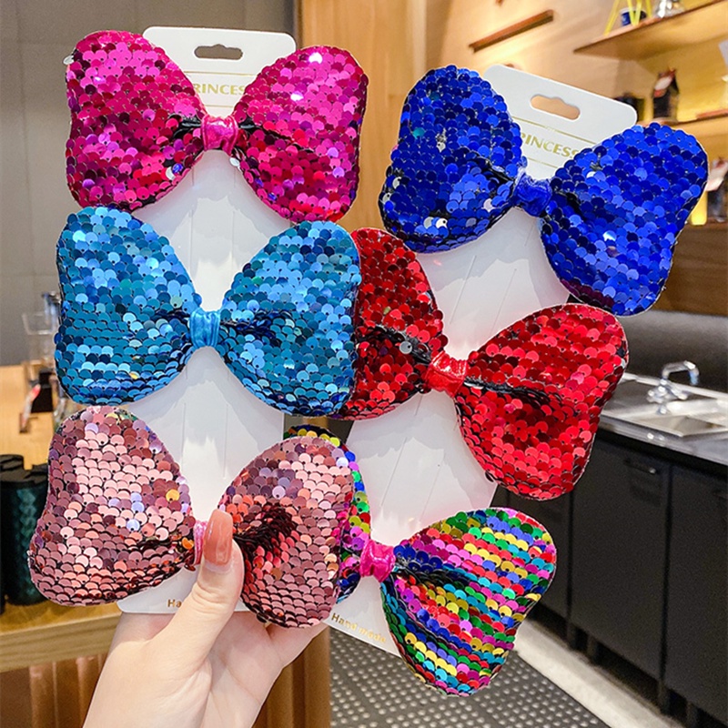 Kẹp tóc trang trí nơ đính sequin lấp lánh màu cầu vồng kiểu dáng thời trang cho bé gái