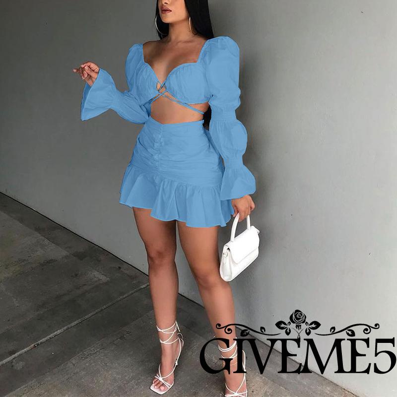 Set đồ 2 món gồm áo croptop cổ chữ v tay phồng màu sắc đơn giản + chân váy lưng cao xếp ly dành cho nữ