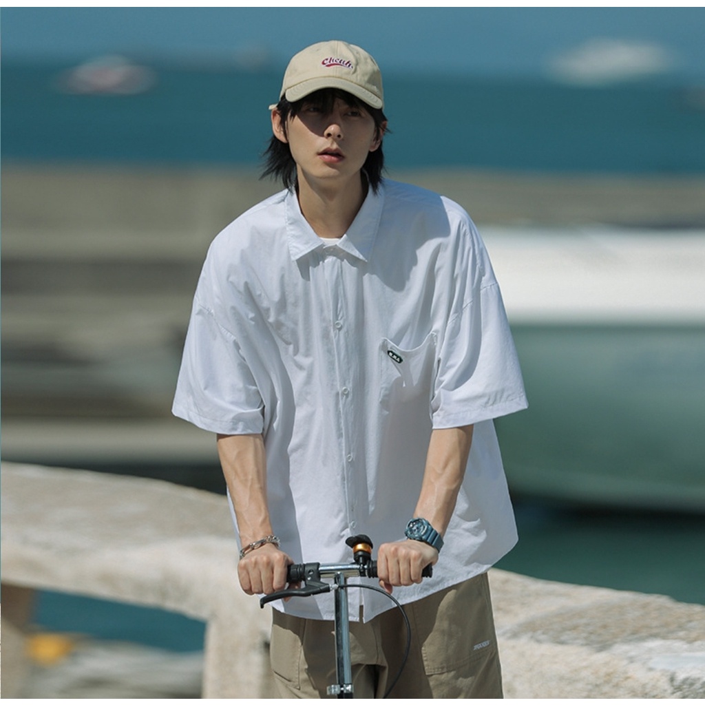 Áo sơ mi trơn MEANSTORE nam nữ tay lỡ Oversize form rộng ulzzang không nhăn dáng suông - LOGO CAO SU