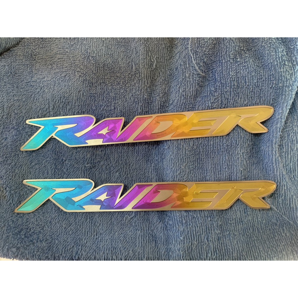 tem chữ RAIDER titanium mẫu điện phân