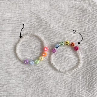 Vòng tay handmade trắng pastel mix hạt charm