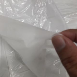Tấm nilong trải ủ tắm trắng dùng trong spa. Quy cách đóng gói: 1 bịch 2500gram .