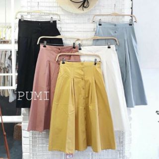 Chân váy xòe phối nút