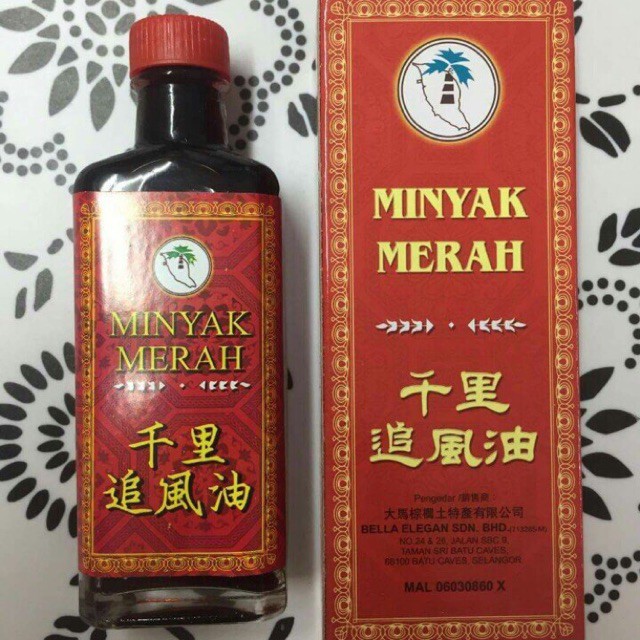 Dầu xoa bóp Minyak Merah
