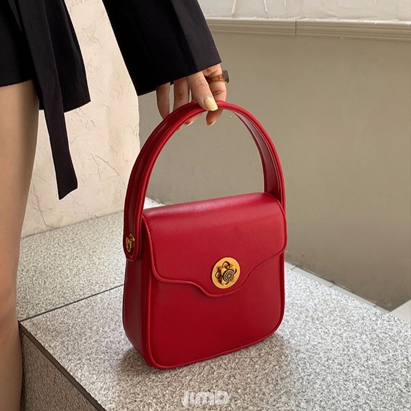 Túi xách thiết kế cao cấp khoá cài bông hoa - HAKEN