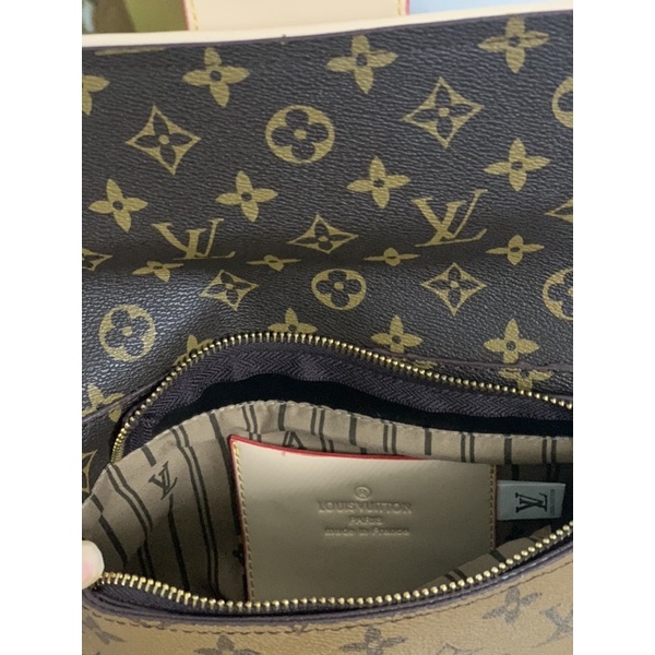 Túi đeo chéo lv lỗi dính màu chút xíu như hình sale