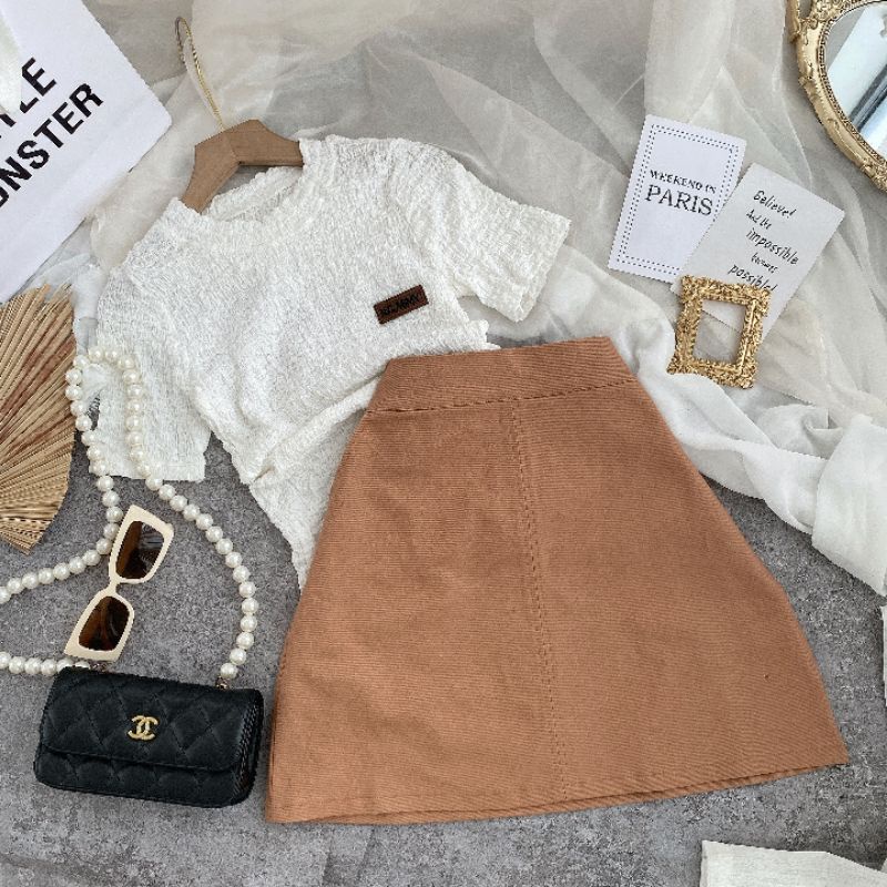 ÁO XỐP NHÚN CỔ TRÒN CHÂN VÁY CHỮ A MÀU NÂU