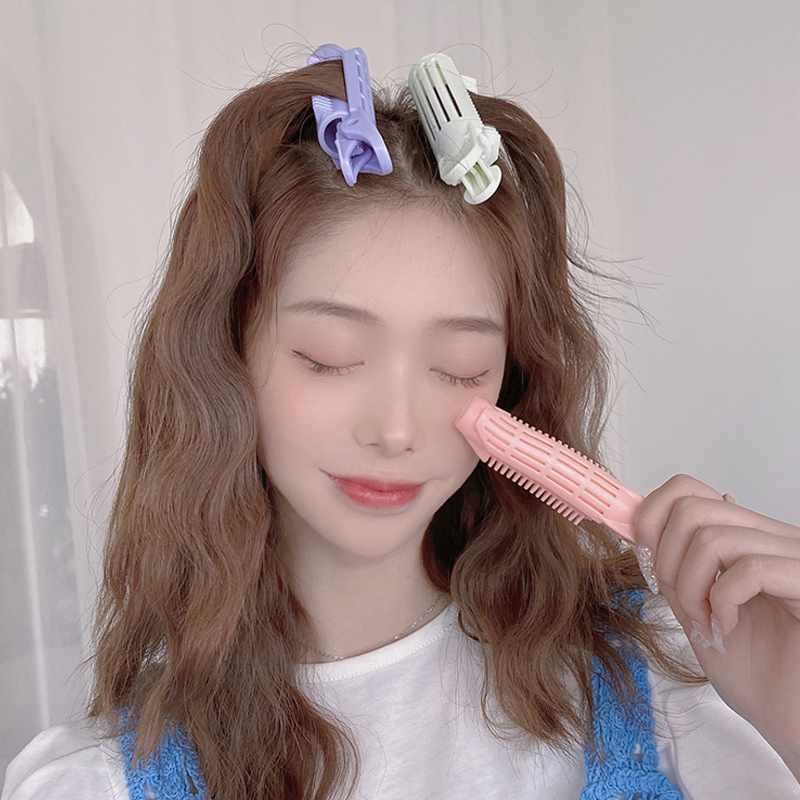 Dụng cụ uốn tóc thời trang dành cho nữ