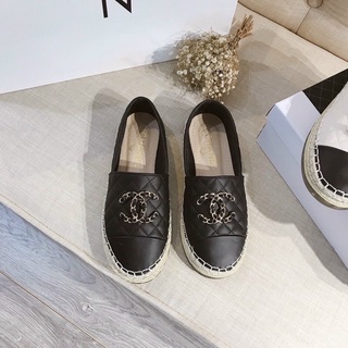 Giày slip on Trần trám gắn chữ X xích