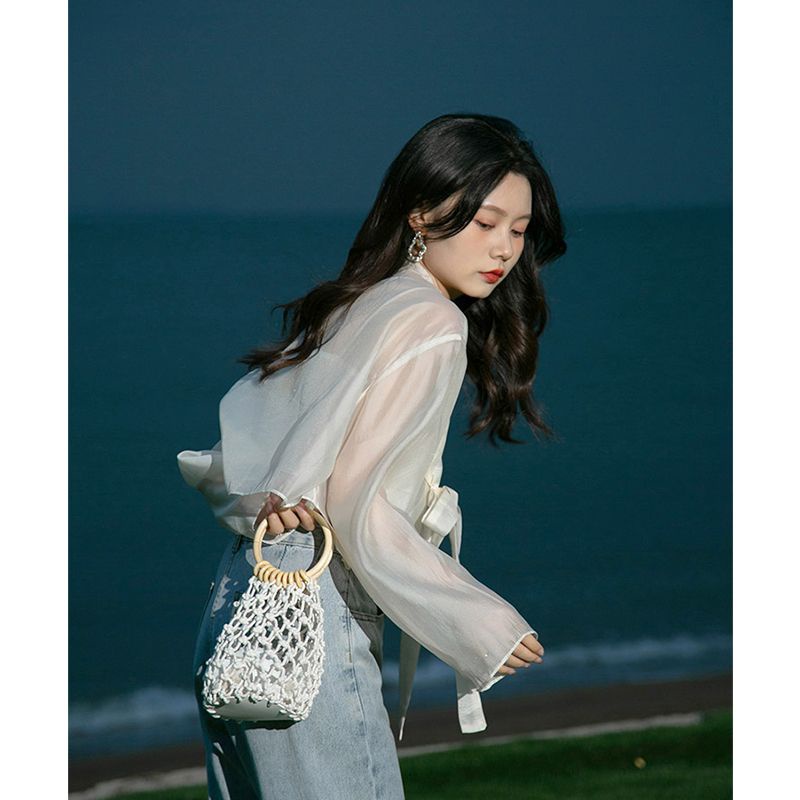 Áo khoác ngoài voan mỏng đi biển thắt nơ hanbok cách tân