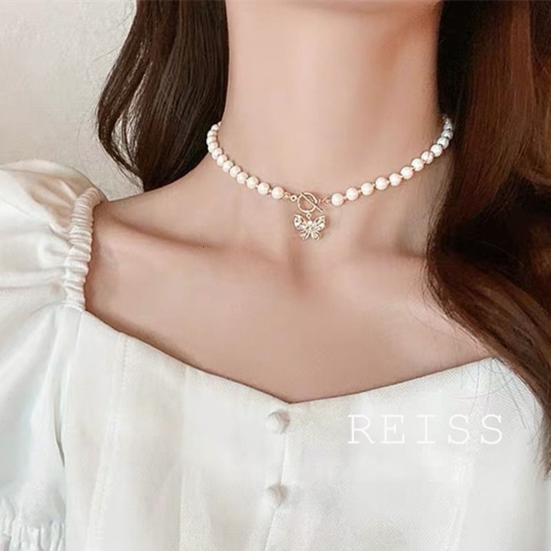Vòng Cổ Choker Mặt Bướm Đính Ngọc Trai Siêu Nữ Tính Phong Cách Hàn Quốc Dongdaemun Mới