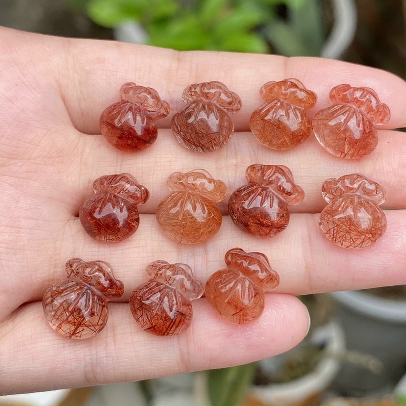 Mặt dây chuyền túi tiền phong thủy đá tóc đỏ