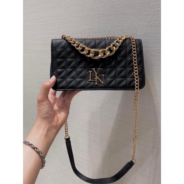 Túi lyn huy hiệu ô trám