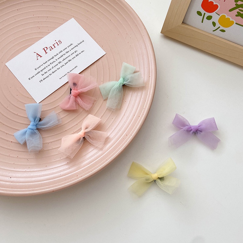 Kẹp tóc lưới đính nơ màu sắc xinh xắn cho bé gái