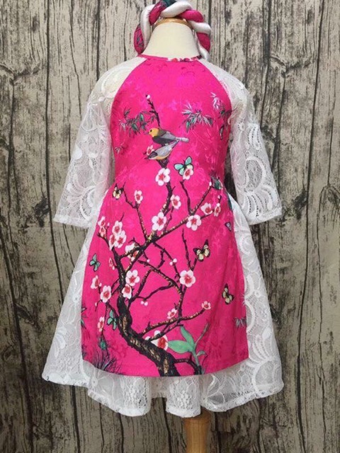 Áo dài dạng váy ren cho bé