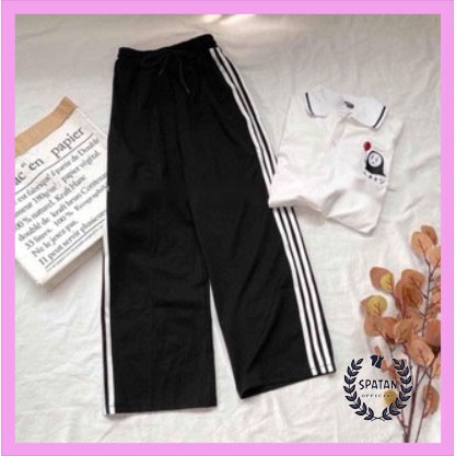 Quần thể thao ba sọc rộng. | BigBuy360 - bigbuy360.vn