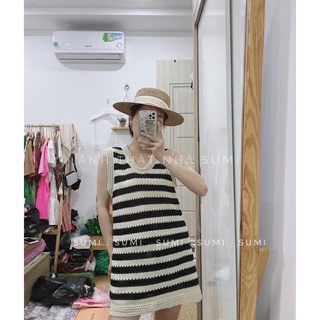 Váy len kẻ đen be lỗ