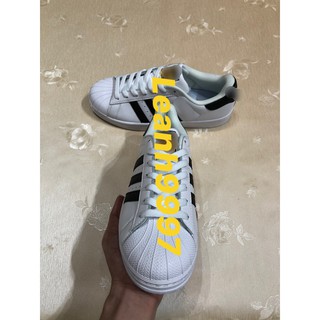 Giày thể thao sneaker kẻ đen