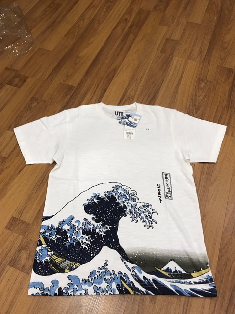 Áo Polo Uniqlo xách Đức