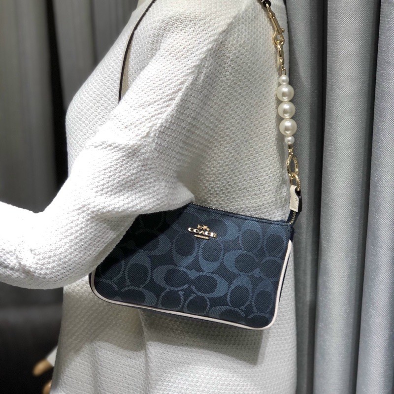 Túi kẹp nách C0ach Nolita