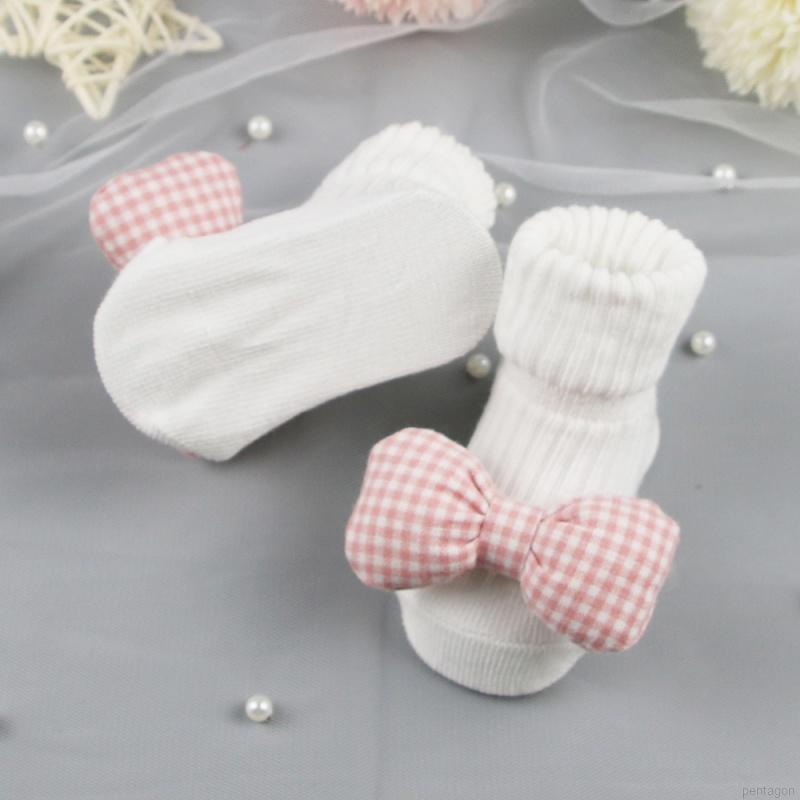 Đôi vớ cotton họa tiết caro đính nơ dễ thương dành cho bé
