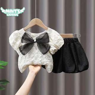 Set áo tay phồng nơ lưng kèm quần gấm cho bé gái size từ 1 2 3 4 5 6 tuổi MINTSCLOSET Mint's Closet - GA2085