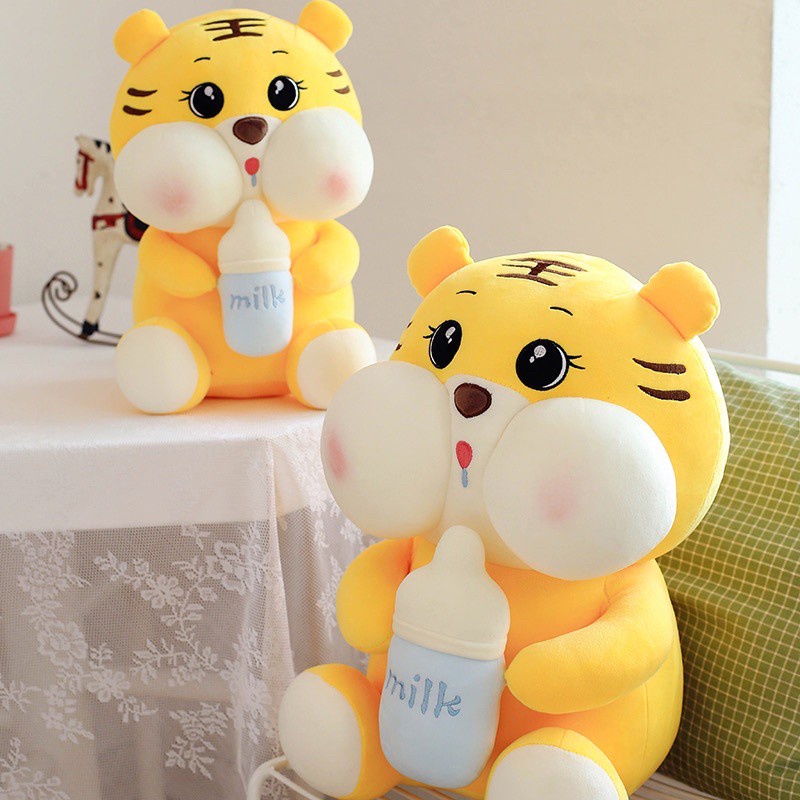 Gấu bông Cọp bông ôm bình sữa