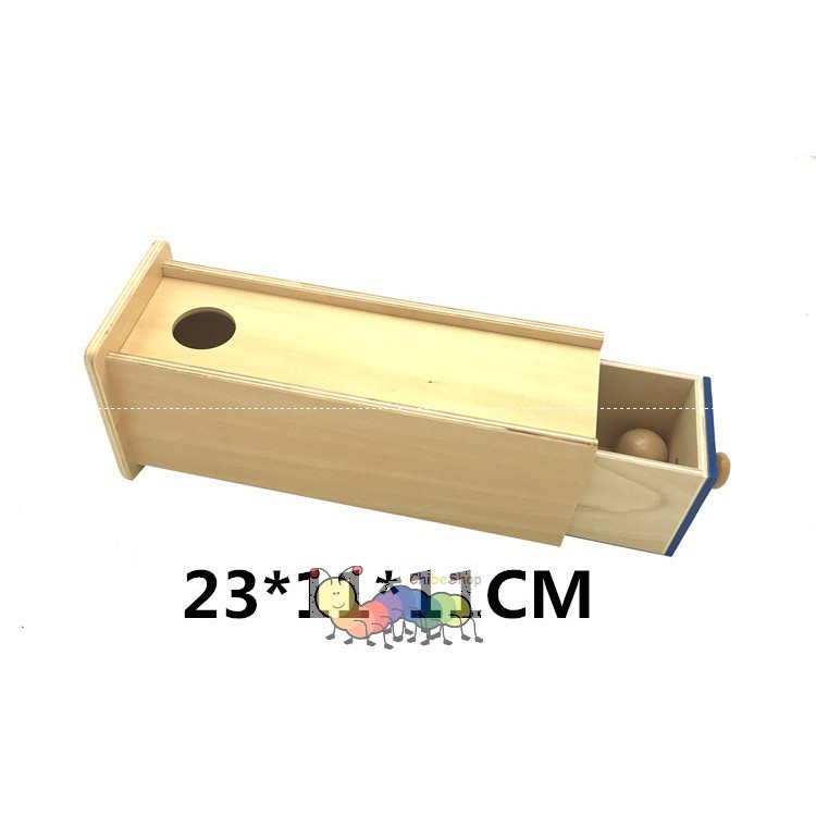 Hộp ngăn kéo và hình tròn dạng đặc, thả bóng gỗ vào hộp gỗ dài - Giáo cụ montessori cho trẻ từ 0 đến 3 tuổi