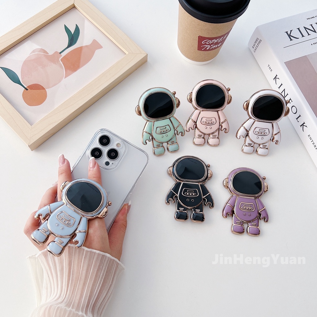 Giá Đỡ Điện Thoại Hình Phi Hành Gia Chống Rơi Tiện Dụng