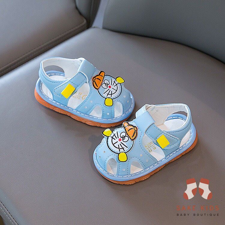 Sandal tập đi bé trai bé gái - Dép rọ có còi hình Đoremon dễ thương chống trơn trượt cho bé từ 0-1 tuổi M301