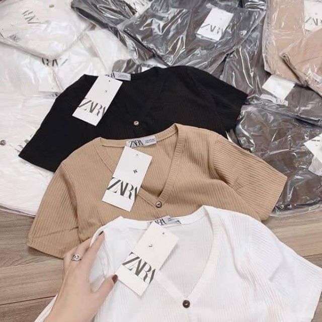 Áo len tăm cổ tim