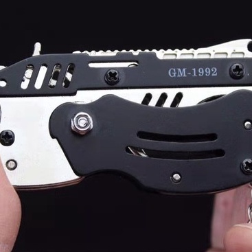 Súng Bắn Nịt Dây Thun Đồ Chơi Vikitoys Móc Khóa Mini Giá Rẻ Bằng Kim Loại Cao Su Mềm An Toàn Có thể Gấp Gọn