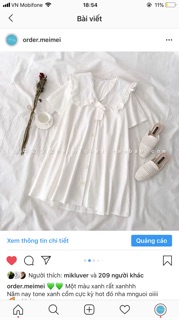 Váy cúc dọc cổ bèo