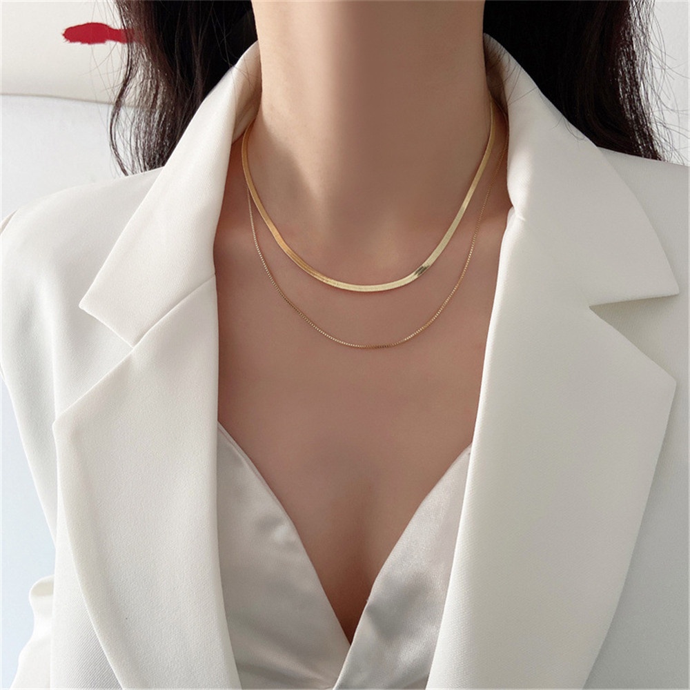 Vòng cổ hai lớp màu vàng thiết kế dạng xương rắn đơn giản