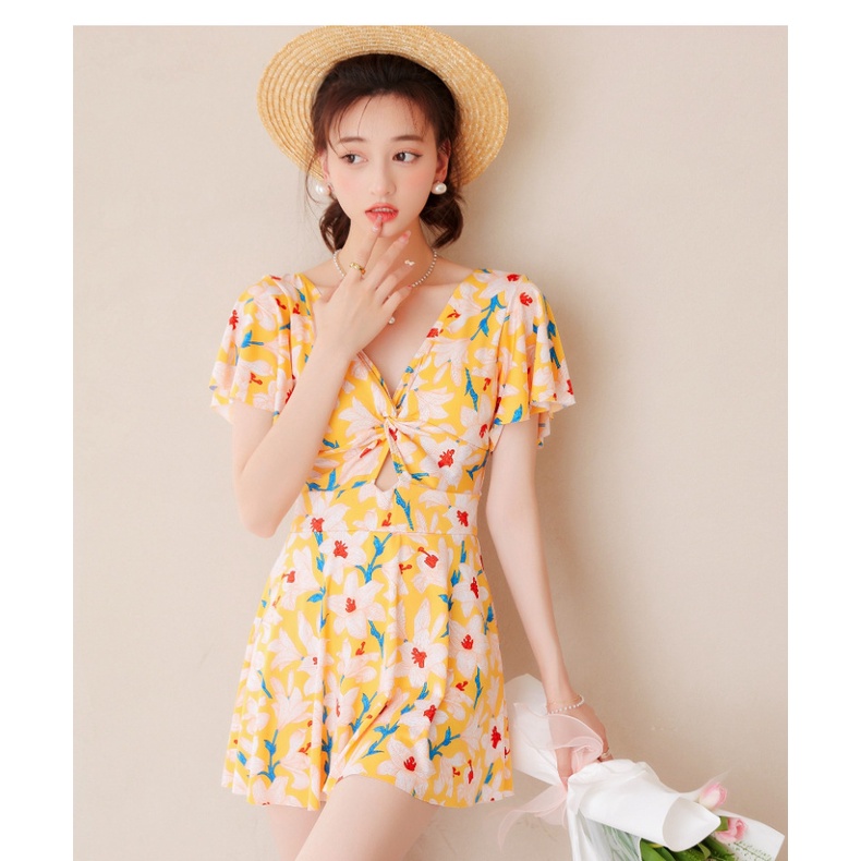 Bộ đồ bơi liền thân dáng váy họa tiết hoa xoắn nơ xinh kín đáo tôn dáng
