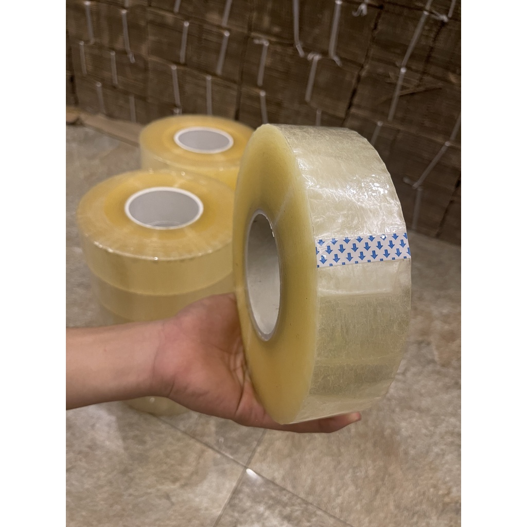 Băng dính màu trắng trong 1kg dùng gói hàng COD lõi siêu mỏng - 1 cuộn