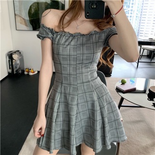 Váy trễ vai kẻ Simbabo