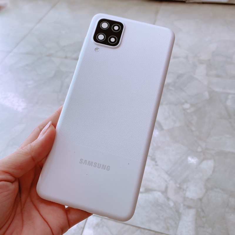 Nắp lưng Samsung A12 kèm cụm kính camera và nút bấm volume , keo dán t8000
