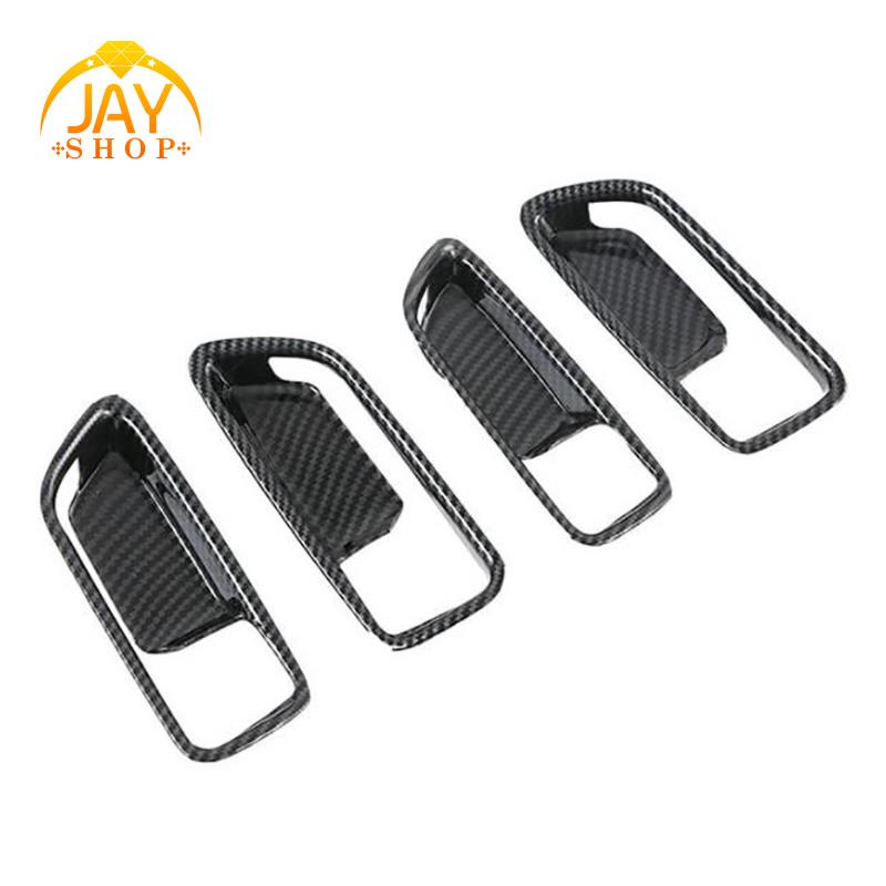 Bộ 4 khung viền tay nắm cửa bên trong xe hơi Toyota Corolla Cross 2020 2021 bằng ABS họa tiết sợi carbon