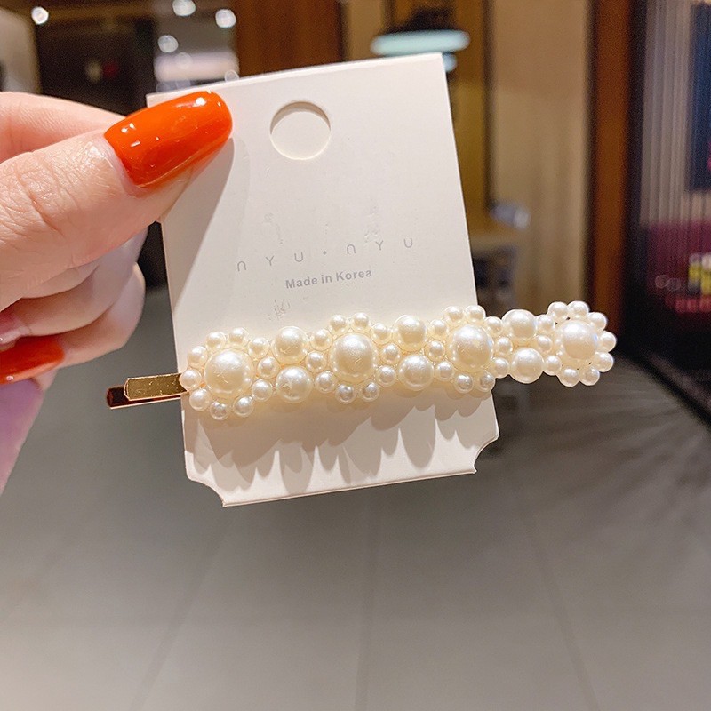 KẸP TÓC NGỌC TRAI