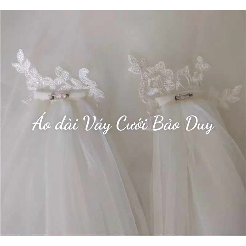 Cài áo- đuôi váy cưới có thể tách làm lúp cô dâu