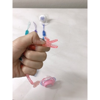 Kẹp ti, dây giữ ti giả