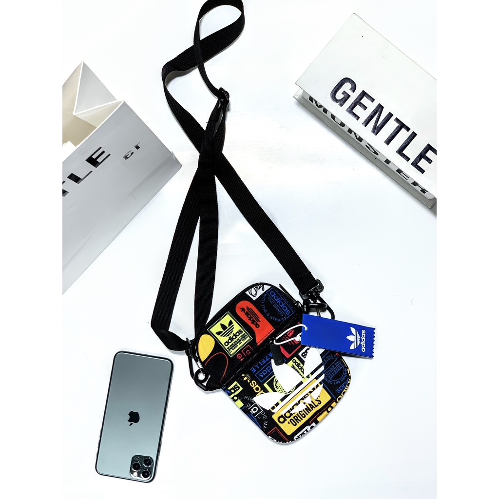 [ HOT TREND ] Túi Đeo Chéo 3 Lá Mini Grafic Festival Bag Mini Trefoil - Full tem tag | BigBuy360 - bigbuy360.vn