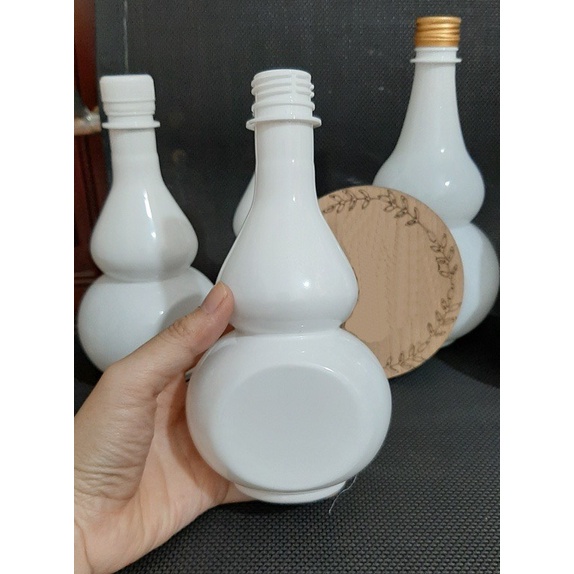 Chai nhựa hồ lô trắng sứ 500ml, 850ml