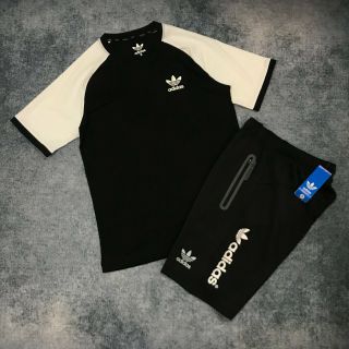 Áo thun logo addidas cổ tròn