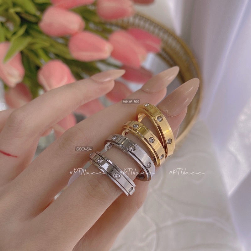 Nhẫn titan thương hiệu cá tính, mặt xoay đính đá .PTNACC.