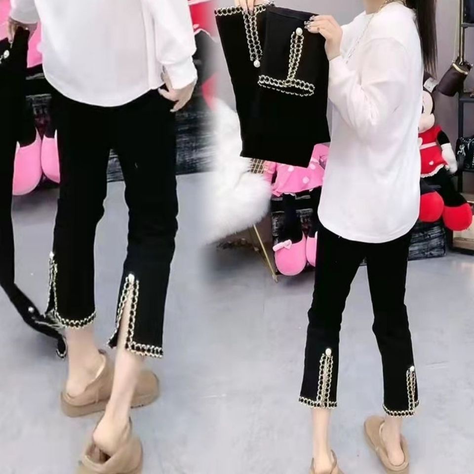 Quần dài ống xẻ dáng thẳng kiểu châu Âu mùa xuân 2022 giúp mảnh mai thon gọn và hút mắt