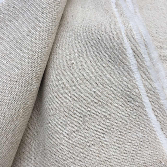 Vải linen bố kem muối tiêu.