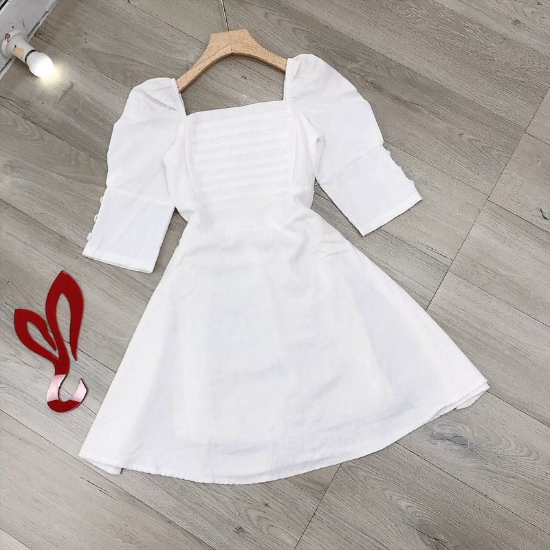 Đầm nút bọc tay phồng xép ly ngực mocking