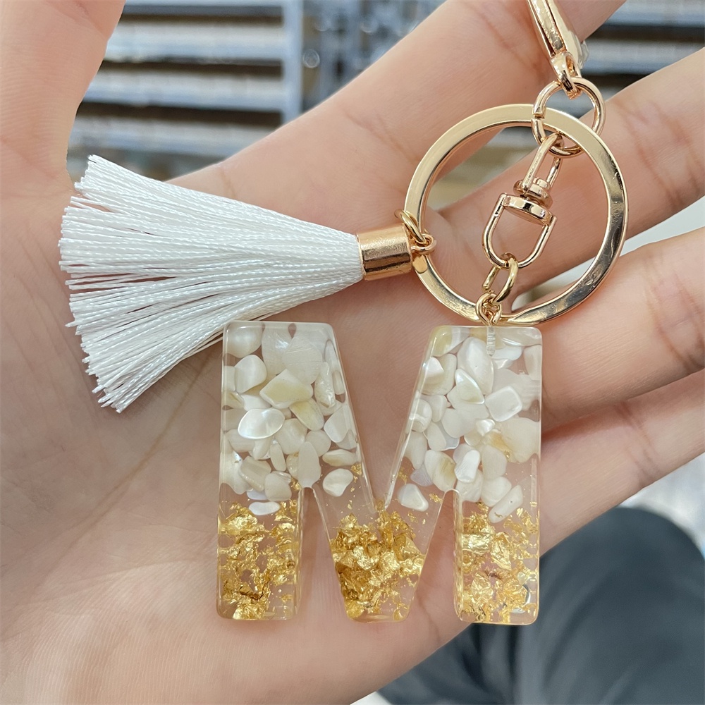 Móc Khóa Nhựa Resin Kim Tuyến Màu Vàng Gradient Phối Tua Rua In Chữ Cái Thời Trang Cho Nữ